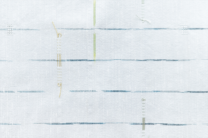 TEORI WORKSの藍の経絣と若草色の緯絣